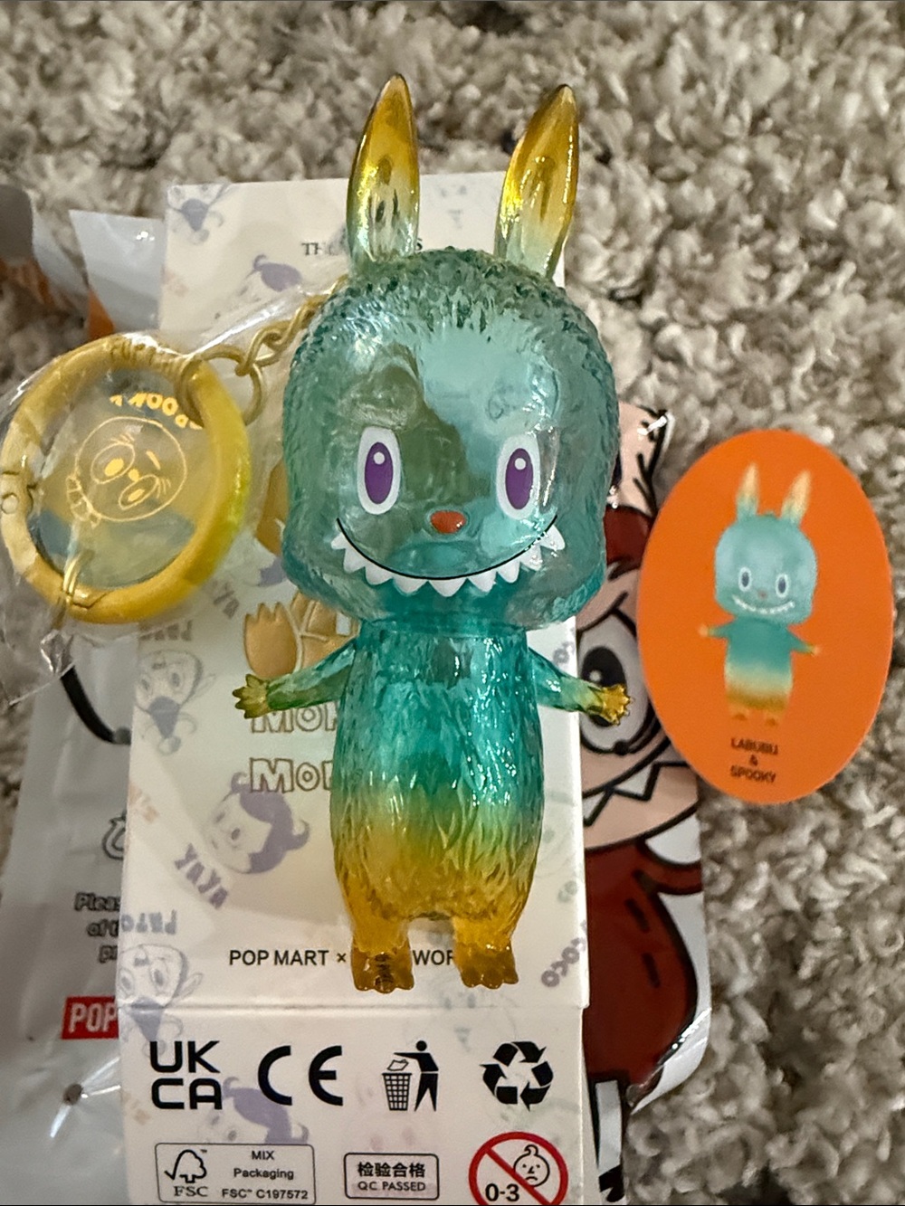Pop Mart Clear Teal & Gold “Labubu & Spooky”. Figure Keychain
